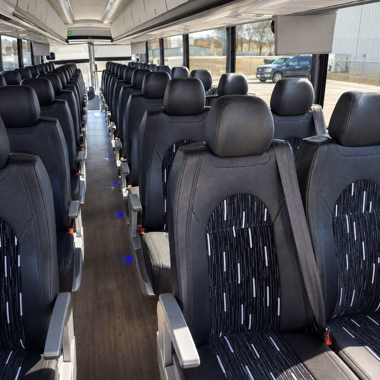 how bus type and size affect charter bus rental prices in royal oak michigan
